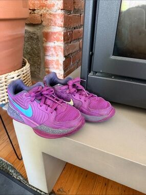 Nike Kids Purple Sneakers with Teal and Lime Swooshes